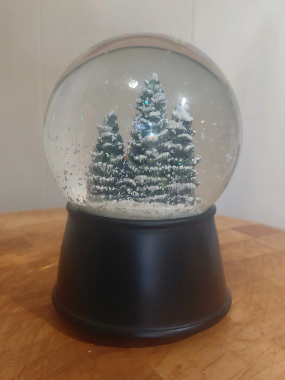 2018 Holiday Fox Snow Globe in Brown and Green with Black Base